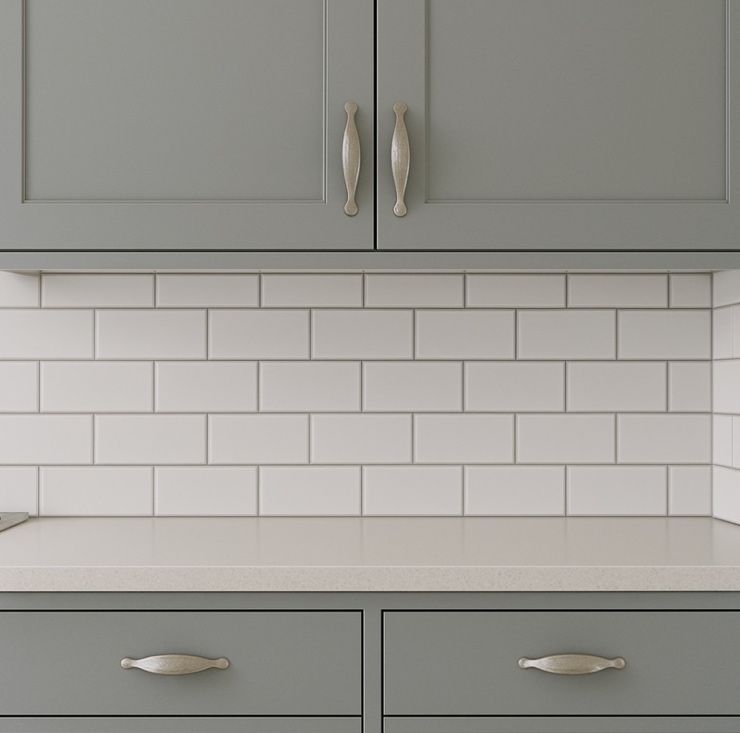Refresh Cabinets with Professional Painting and Trim with painted cabinets and a  kitchen counter with white tile.